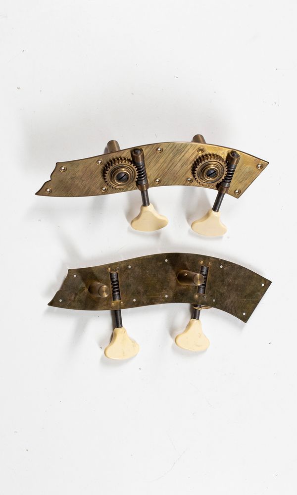 A set of cello mechanical  pegs