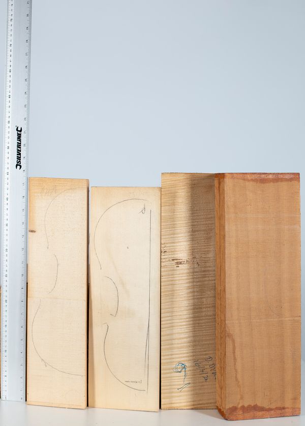 Three spruce violin fronts and one violin back