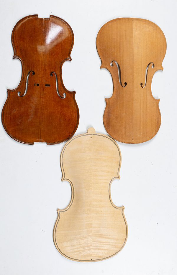 Two violin fronts and one back