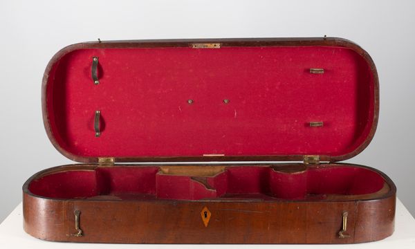 A double violin case, branded Withers, Sons & Co.