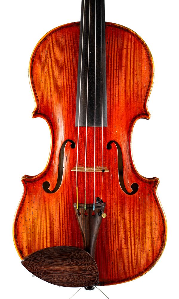 A violin, labelled Emile Français