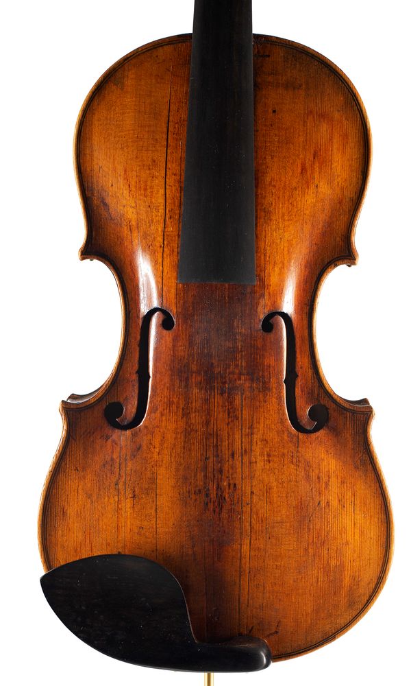 A violin, labelled Carlo Testore, Milano