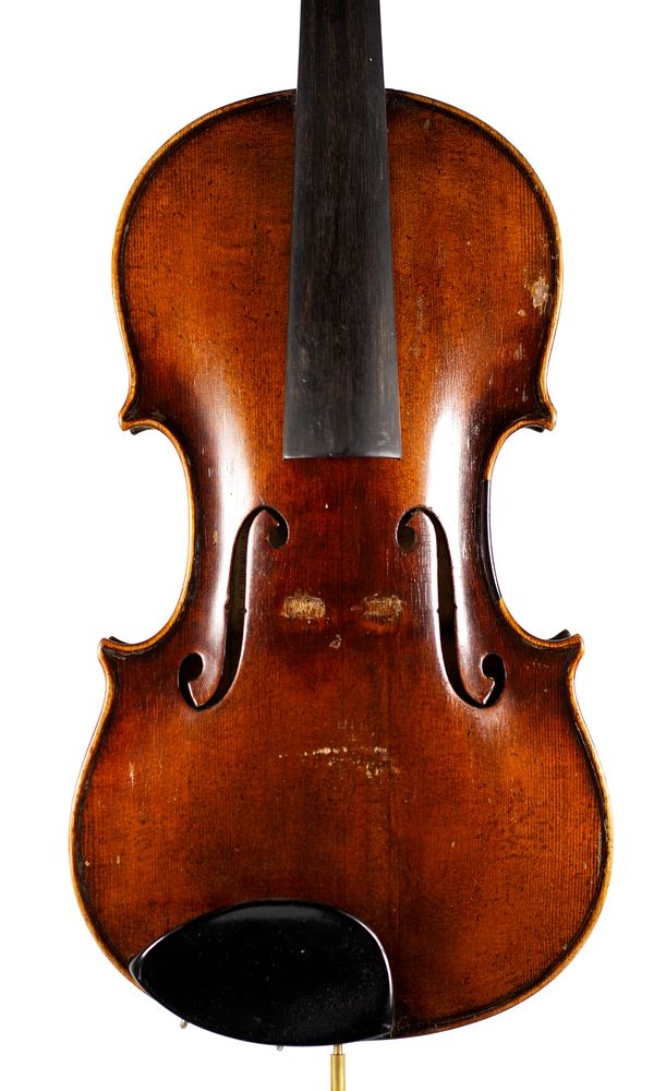 A violin, labelled Petrus Guarnerius