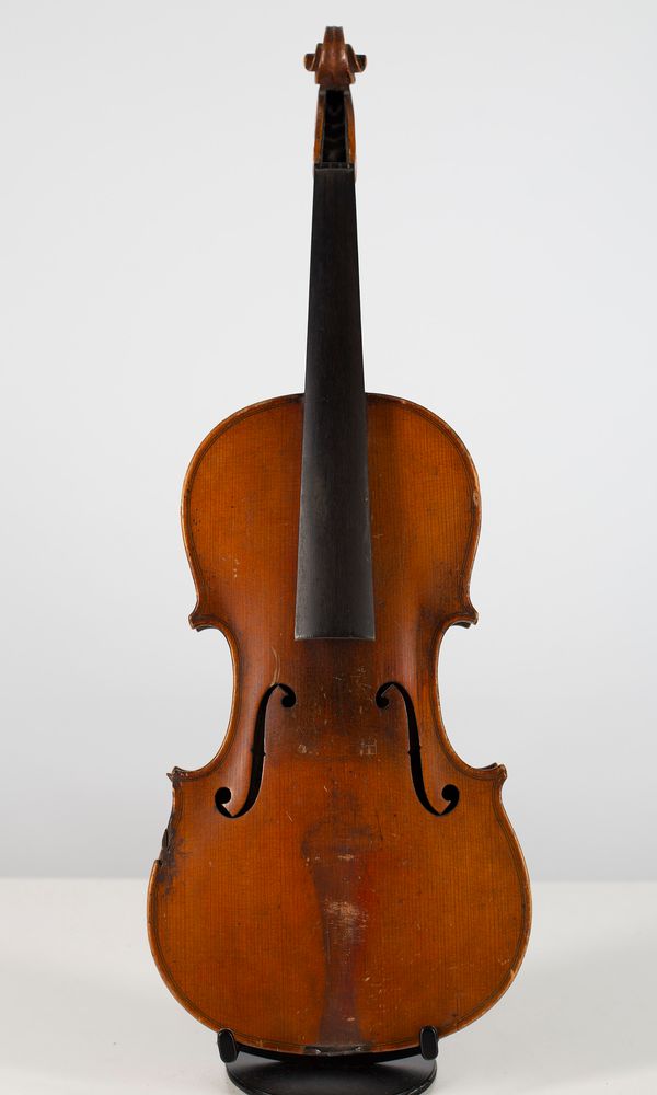 Three full size violins and one three-quarters violin