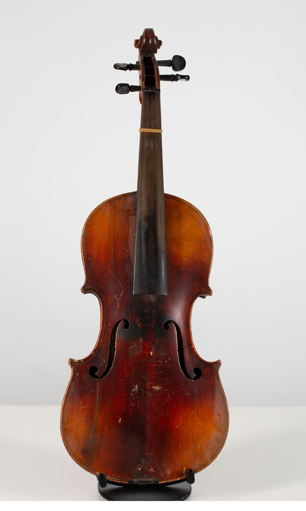 Three full size violins and one three-quarter violin