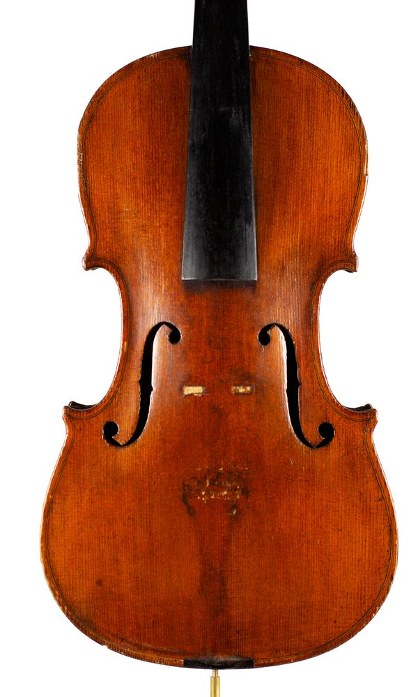 A violin, labelled Wolff Bros.