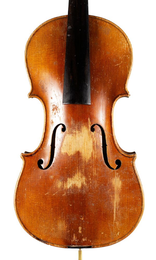 A violin, labelled Manufactured in Berlin