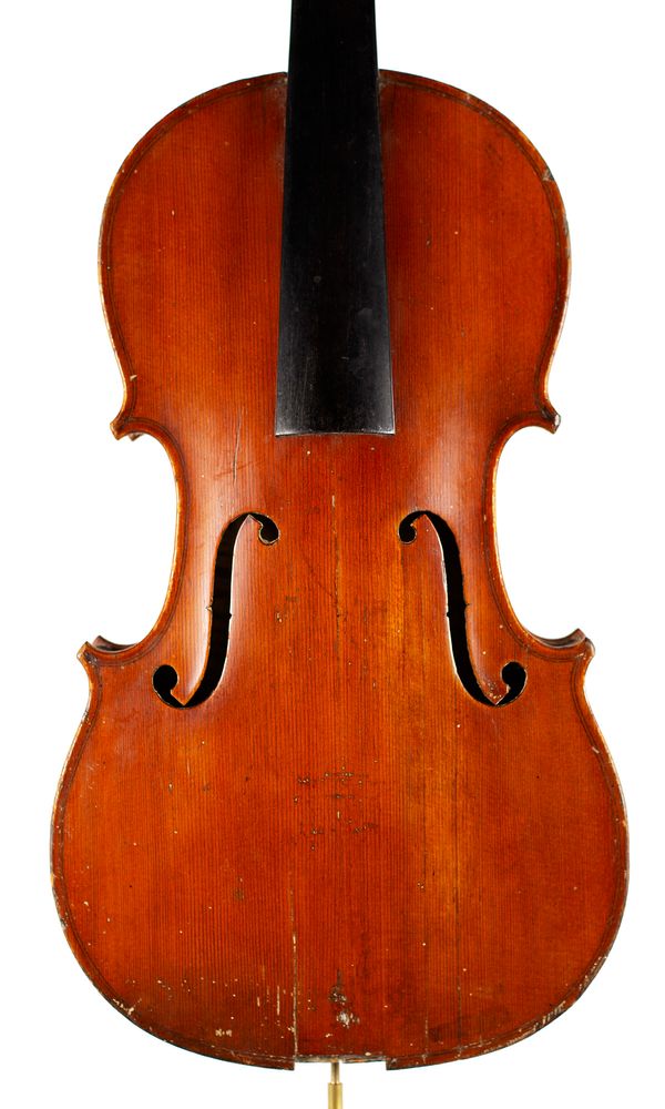 A violin, labelled A. Magne Luthier