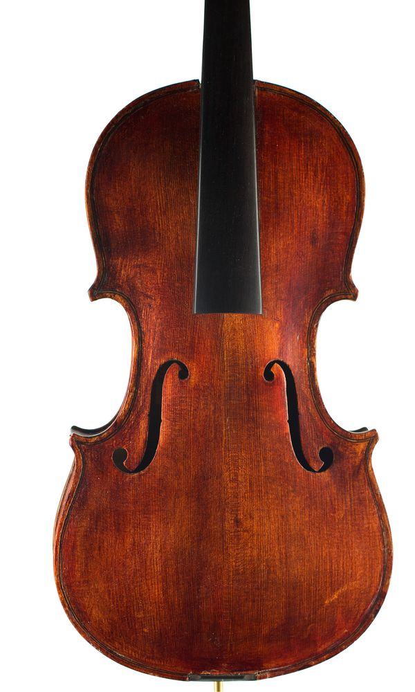 A violin, labelled Repaired by RD Carr