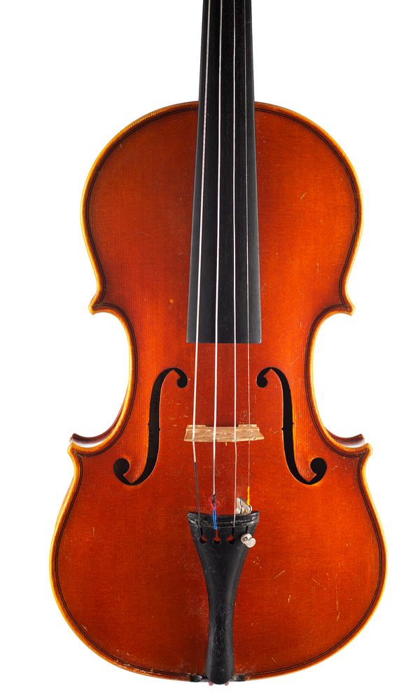 A violin, labelled Enrico & Raul Politi