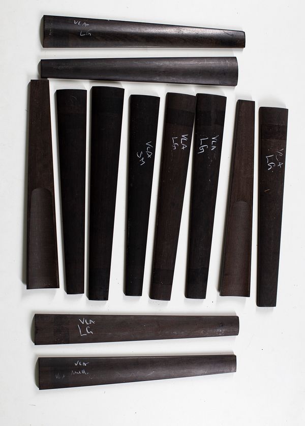 Twelve viola fingerboards