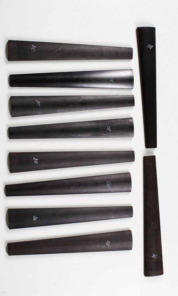 Ten violin fingerboards