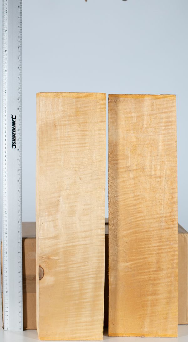 Two cello neck blocks, maple