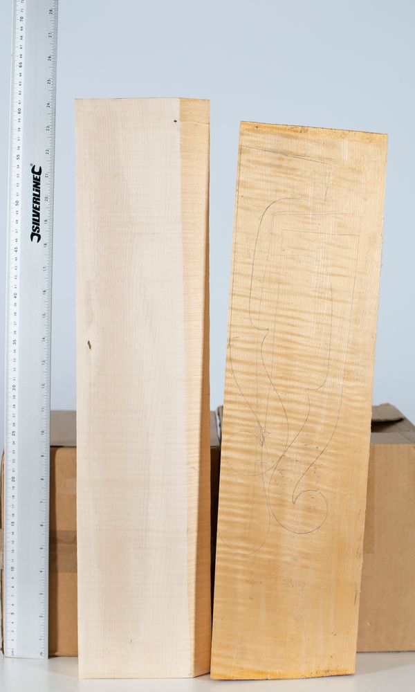 Two cello neck blocks, maple