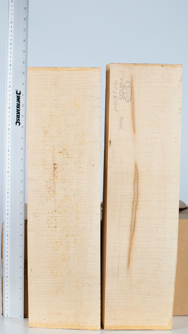 Two cello neck blocks, maple