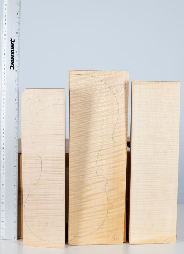 Three violin backs and one viola back, maple