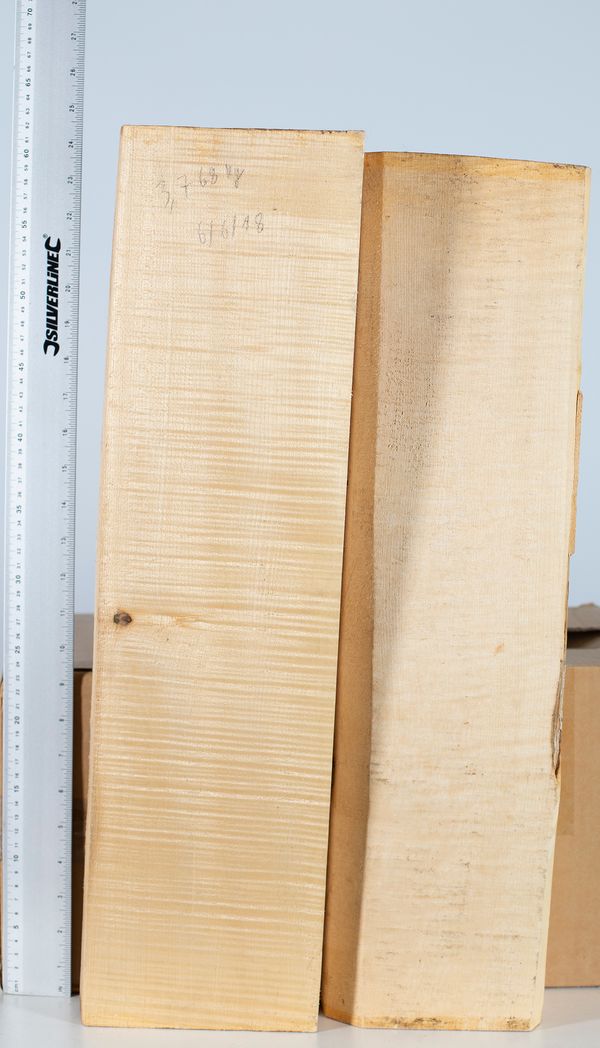 Two cello neck blocks, maple