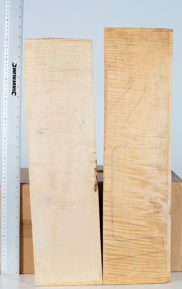 Two cello neck blocks, maple