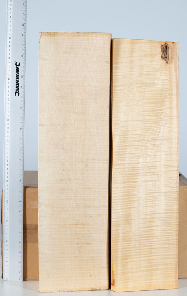 Two cello neck blocks, maple