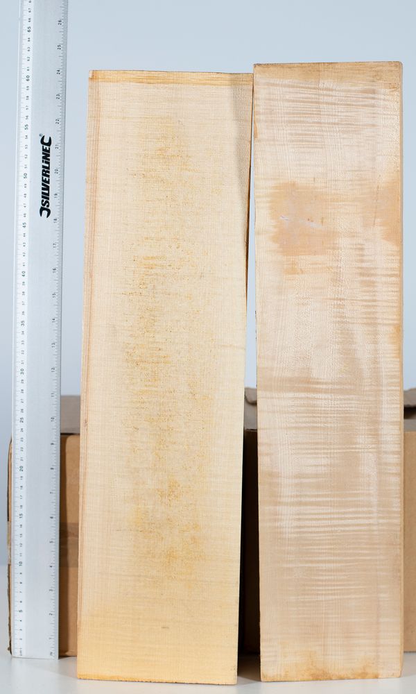 Two cello neck blocks, maple