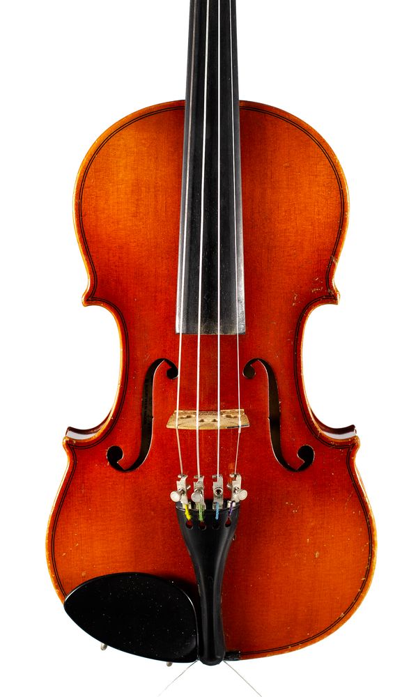 A half-sized violin, labelled Suzuki