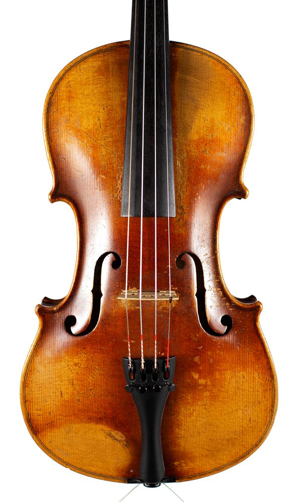 A violin, labelled Joan Carol Kloz