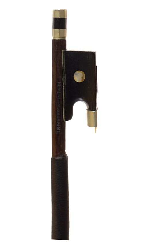 A nickel-mounted violin bow, branded Remenyi