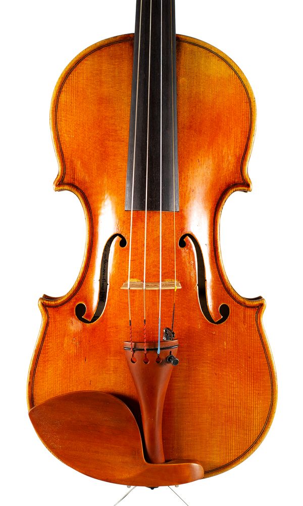 A violin, labelled Corrado Gritti Candi