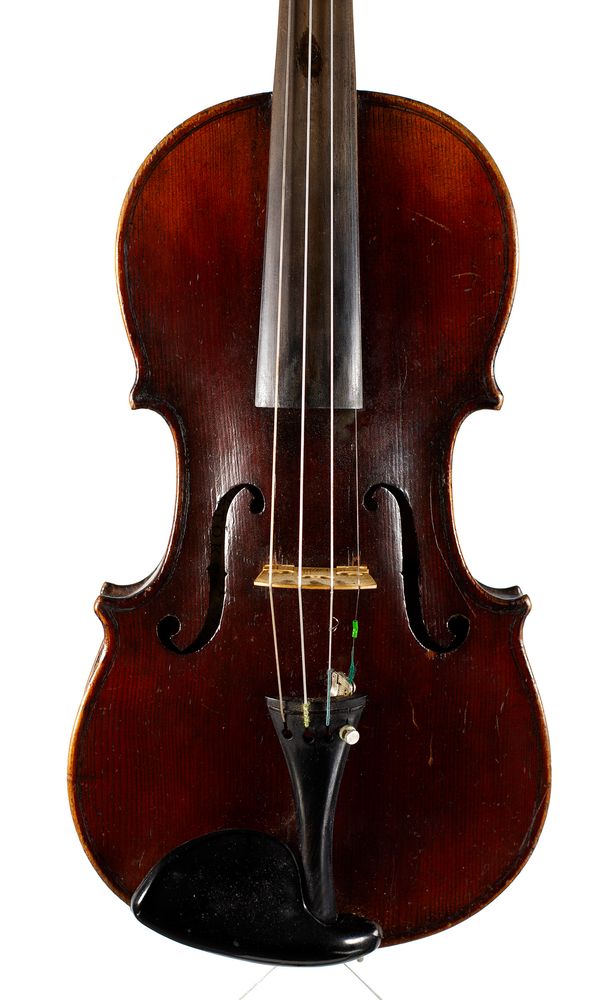 A violin, labelled J. Stokes, Music & Instrument Warehouse