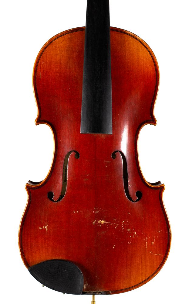 A violin, labelled Copy of Antonius Stradiuarius