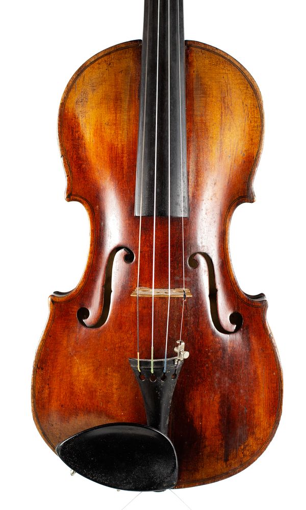 A violin, labelled Carolus...