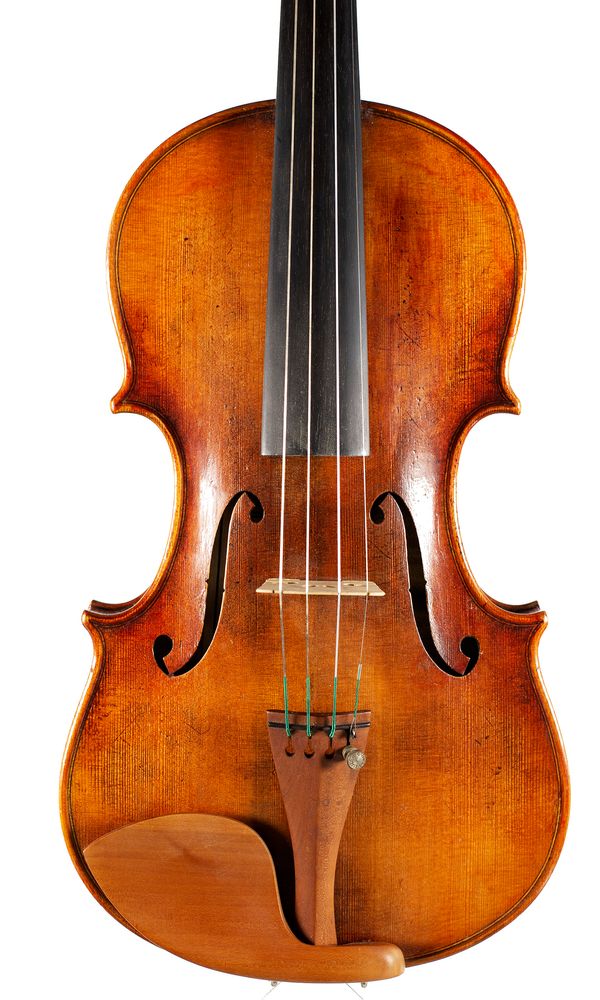 A violin, labelled Marius Capicchioni