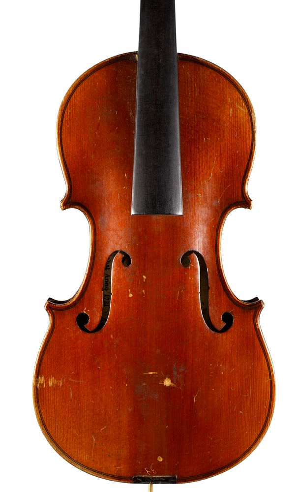 A half-sized violin, labelled Copie de Antonius Stradiuarius