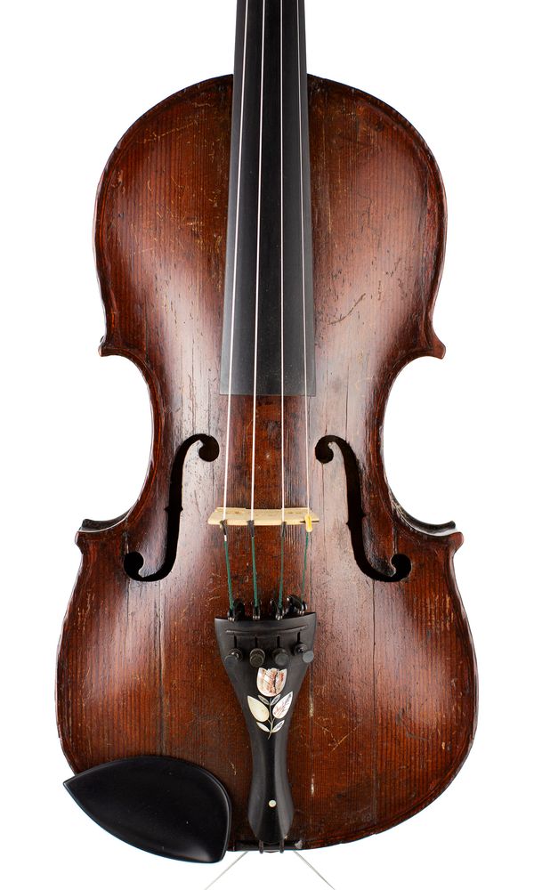 A violin, labelled Repair by C. Silcock