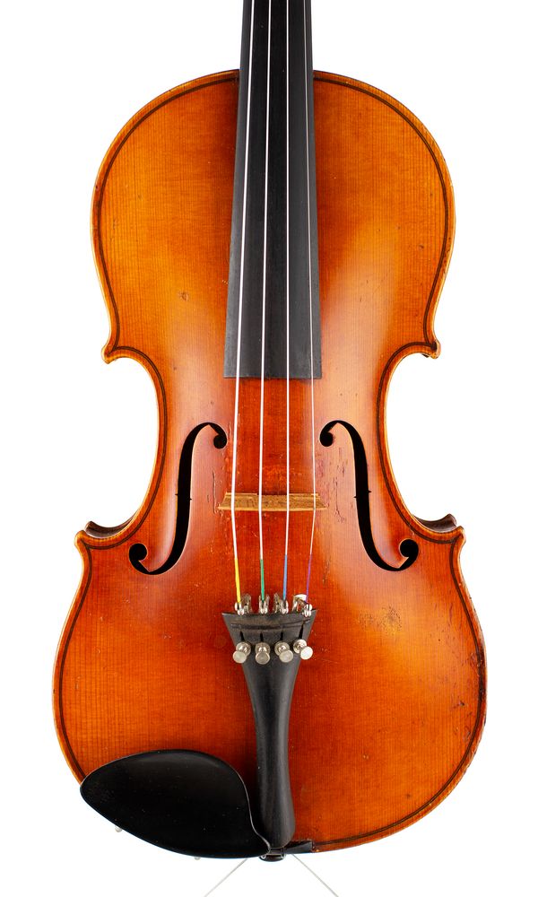 A violin, labelled C. F. Schuster & Sohn