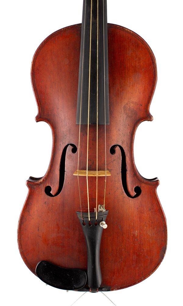 A violin, labelled Repaired by J. Stuart