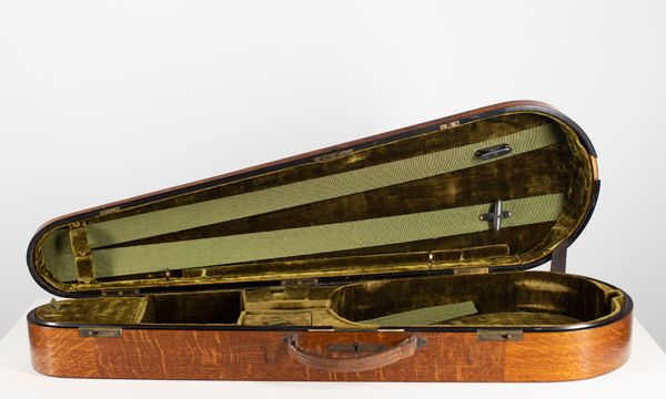 A violin case branded W. E. Hill & Sons
