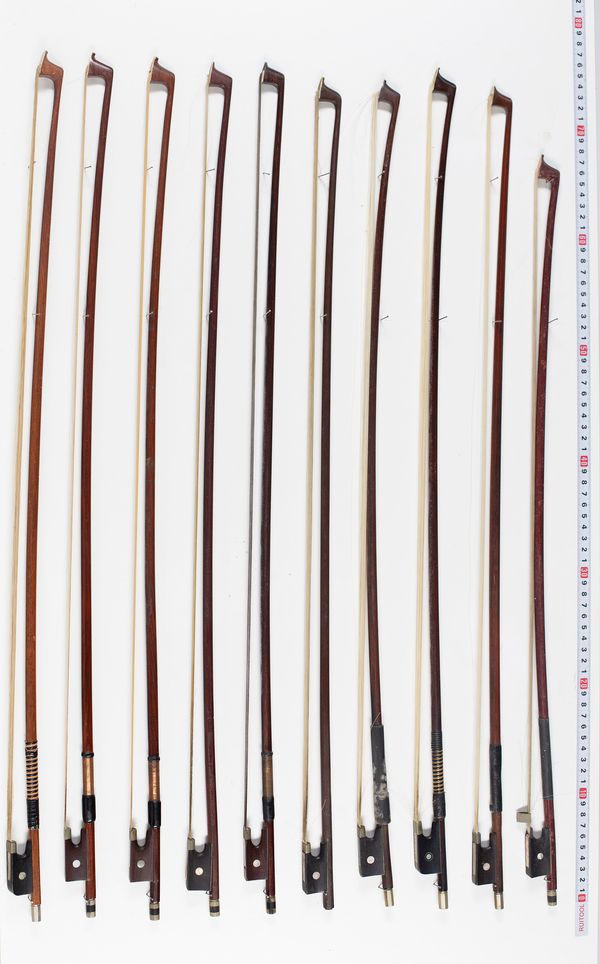 Ten violin bows, varying lengths