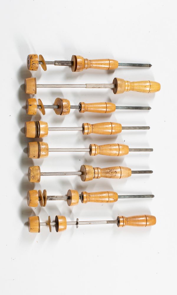 Eight violin clamps
