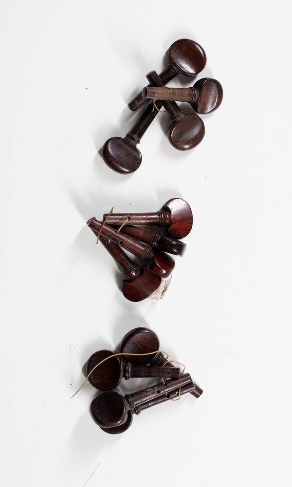 Three sets of cello pegs