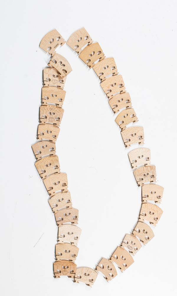 Thirty violin bridges, varying sizes