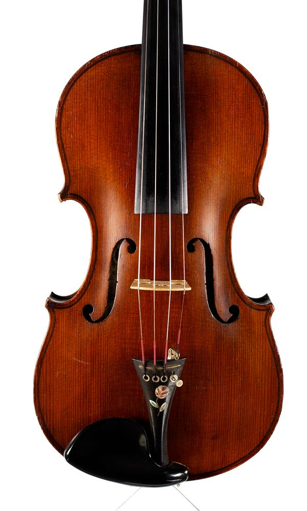 A violin, labelled Schuster & Co.