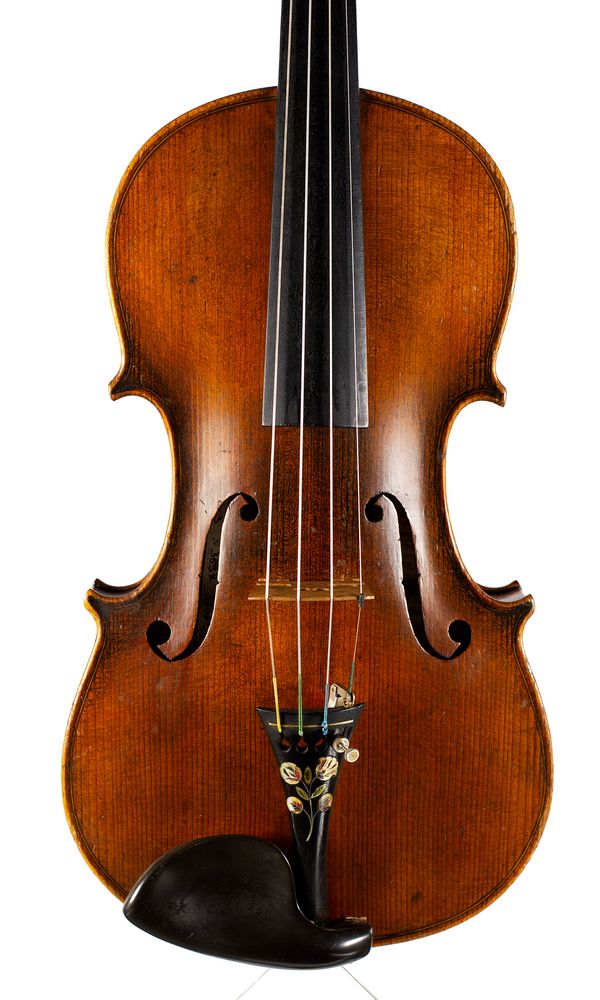 A violin, labelled Wolff Bros.