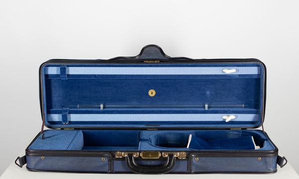 A violin case, branded M.A. Gordge