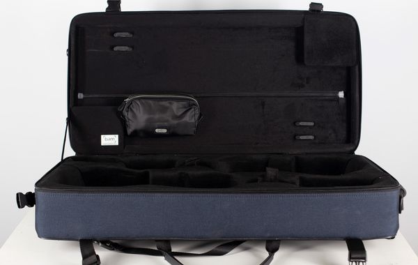 A case with space for a viola and a violin, branded Bam