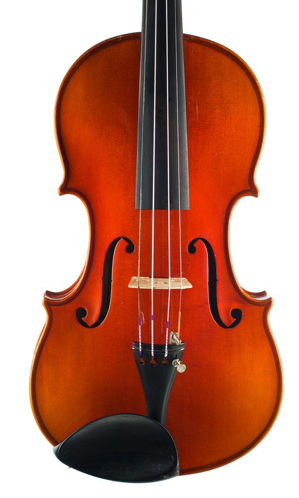 A violin, labelled Albert Schlegel