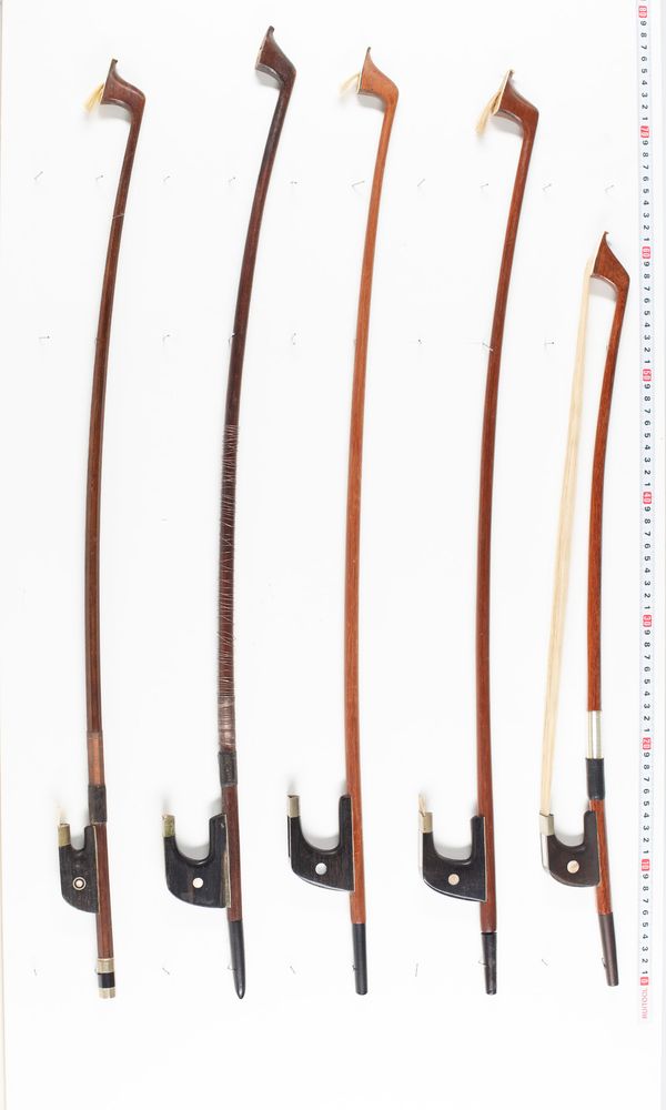 Sixteen double bass bows, various lengths