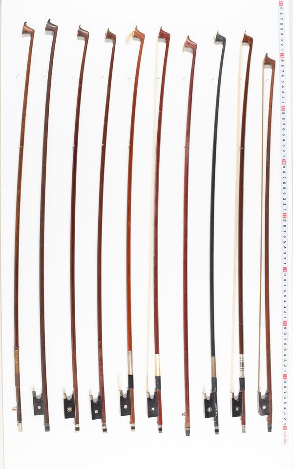 Seventeen violin bows, two cello bows and four sticks, various lengths