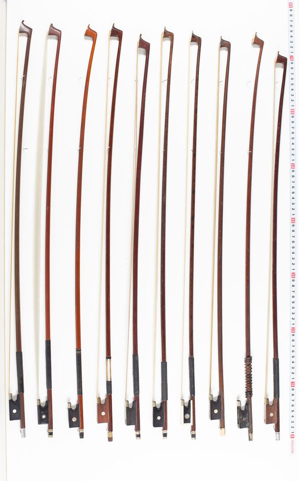 Sixteen violin bows, one cello bow and one double bass bow, various lengths