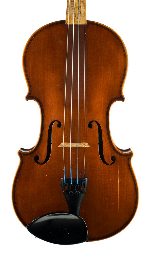 A violin, labelled Carl Gottlob Schuster Jun, 1910 Over 100 years old